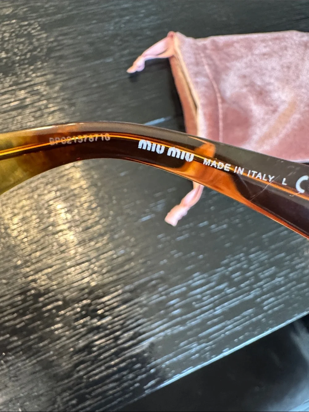 Miu Miu Tortoiseshell Sunglasses with Gold Logo Accents